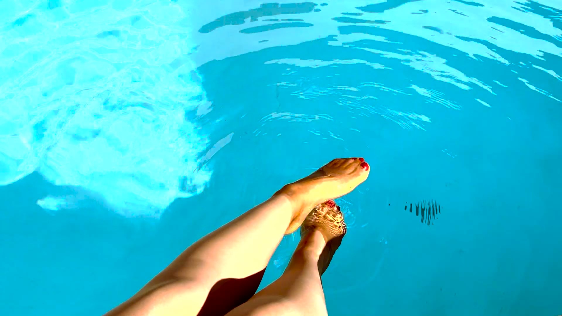 Dipping my feet in the water wearing pantyhose