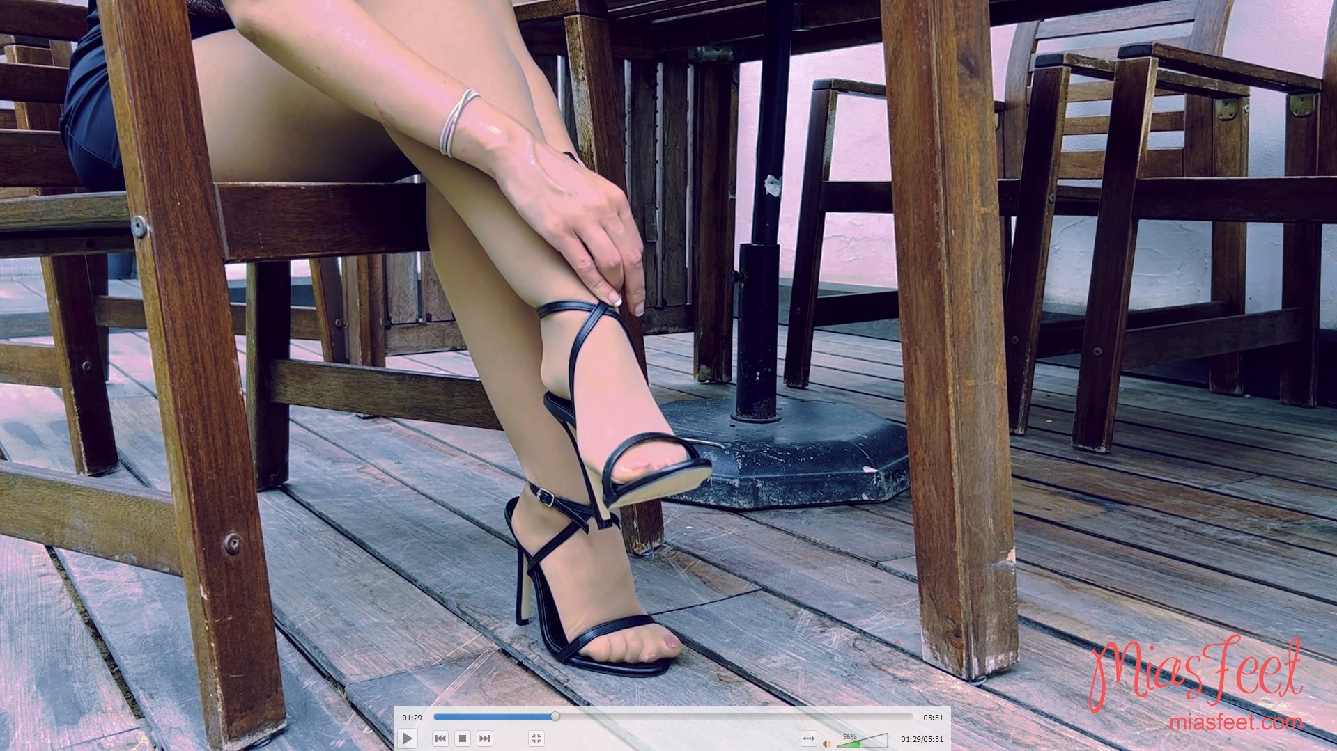 Taking off my high-heeled sandals revealing my nylon feet
